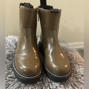 Green rain boots